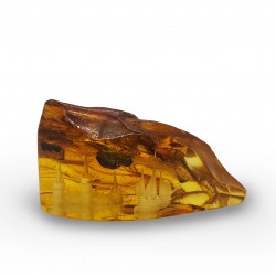 Amber piece with sculpted landscape inside